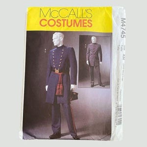 May include: A sewing pattern for a men's costume. The pattern is for a long coat with a high collar and a sash. The pattern is from McCall's Costumes and is size XIM. The pattern number is M4745.