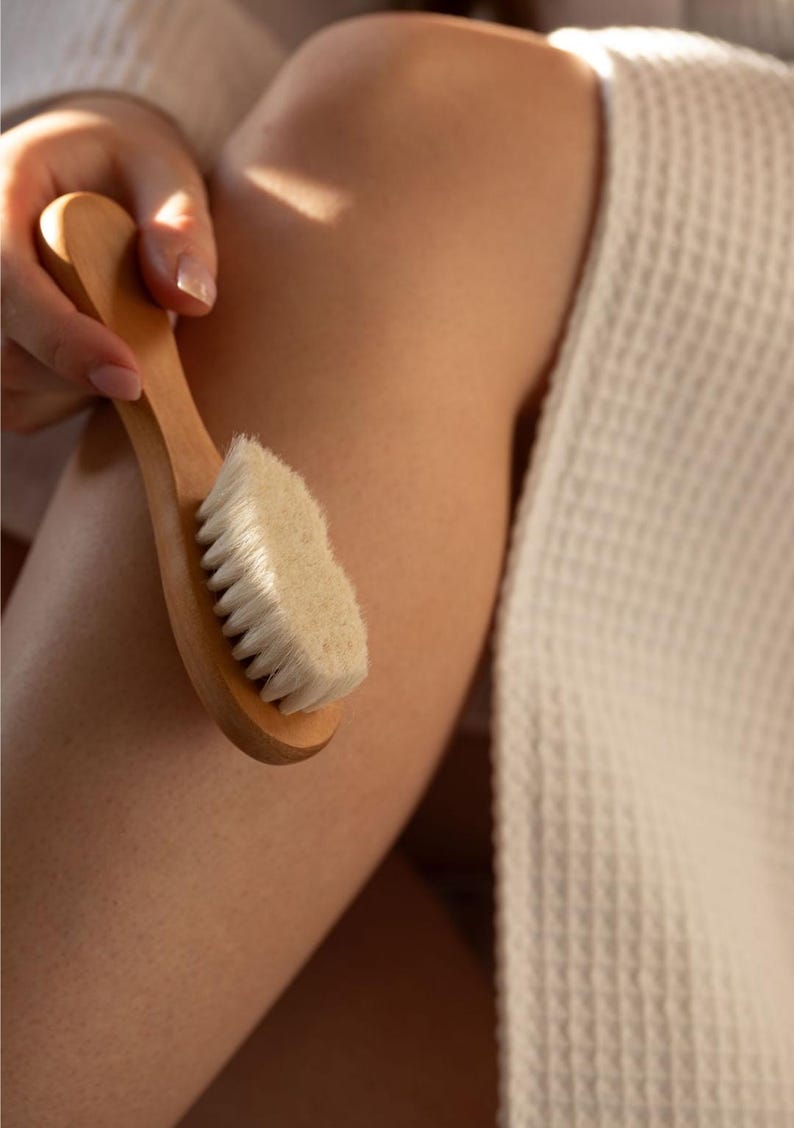 Close-up of a Kayle at Home facial dry brush, featuring natural bristles for effective yet gentle facial care.
