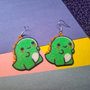 Brincos de dinossauro fofos Brinco de dinossauro Kawaii Tiranossauro Rex Jóias pré-históricas Brinco de dinossauro T-Rex divertido e peculiar para amantes de dinossauros