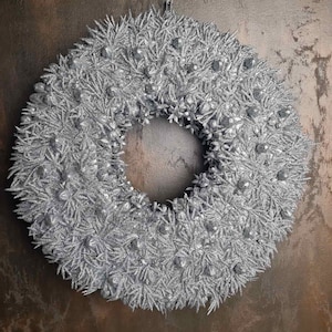 A double-sided Christmas decoration for a fabulously beautiful home window, showcase. Unique wreathe. Christmas decoration. Christmas gifts.
