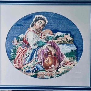 Handmade cross-stitched picture. Framed. Handmade.