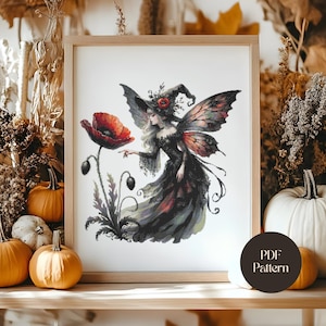 May include: A framed cross-stitch pattern featuring a fairy with dark wings and a witch's hat, standing near a large red poppy. The fairy is dressed in a black gown. The artwork is set against a backdrop of autumn leaves and pumpkins. The text "PDF Pattern" is in the lower right corner.