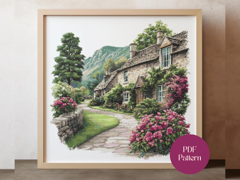 May include: A framed watercolor print of a quaint stone cottage with a winding path. Lush greenery and vibrant pink flowers adorn the building and surrounding landscape. A tall tree and a mountain are in the background. The print is labeled "PDF Pattern".