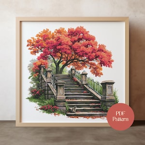 May include: A framed print of a watercolor painting featuring a stone staircase leading up to a large tree with vibrant red and orange leaves. The artwork includes a small cat and the text "PDF Pattern".