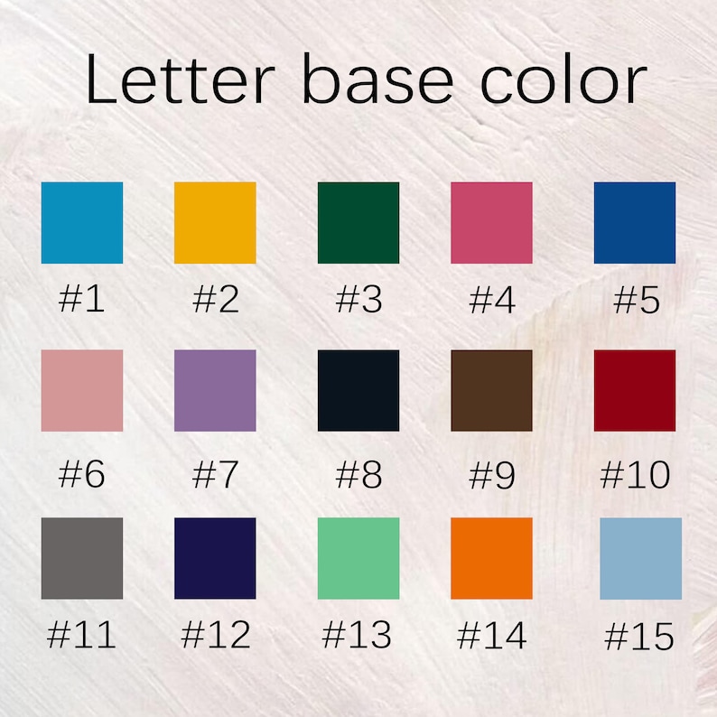 K&ouml;nnte beinhalten: Bild mit einer Farbkarte mit der Aufschrift "Letter base color". F&uuml;nfzehn Farbfelder sind abgebildet, jedes mit einer Nummer. Zu den Farben geh&ouml;ren Blau, Gelb, Gr&uuml;n, Rosa und andere. Die Karte dient zur Auswahl einer Grundfarbe.