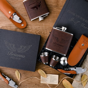 May include: A gift set with a brown leather flask, two shot glasses, a bottle opener, and a brown leather pouch. The flask is engraved with the text "Brianna 2023.10.10". The pouch is engraved with the text "Thank you for being my Best Man".