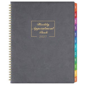 May include: A dark gray weekly appointment book for 2027 with a gold-colored wire spiral binding on the left side. The front cover features the gold text Weekly Appointment Book 2027 inside a rectangular border. Multi-colored monthly tabs are visible.