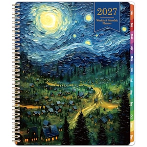 May include: A 2027 weekly and monthly planner with a spiral binding. The cover features an oil painting style depiction of a night sky with a bright moon and stars above a village with small houses, trees, and a winding path. Includes month tabs.