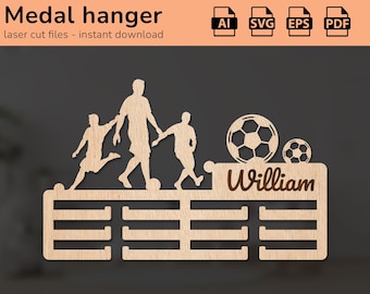 May include: Wooden medal hanger with a soccer theme. It features three silhouetted figures playing soccer, a soccer ball, and the name "William". The hanger has eight slots for medals.