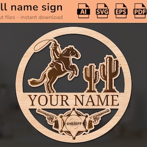 以下が含まれることがあります： カウボーイが馬に乗っている、サボテン、保安官の星が描かれたレーザーカットの木製看板。看板には「YOUR NAME」と「SHERIFF」と書かれています。