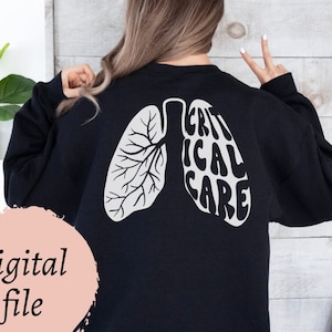 May include: Black sweatshirt with a white graphic of lungs and the text "Critical Care" on the back.