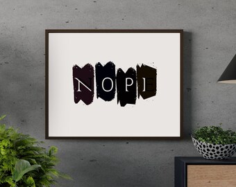 May include: A framed print with a white background and black brushstrokes forming the word "NOPE" in white letters.