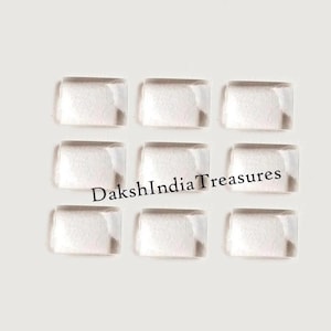 Könnte beinhalten: Neun rechteckige, transparente Glasfliesen, jede mit einer leicht mattierten Oberfläche. Die Fliesen sind in drei Reihen zu je drei angeordnet.