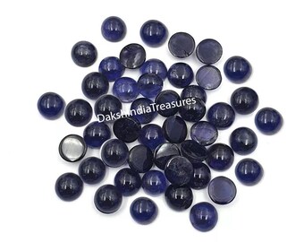 May include: A collection of round, dark blue cabochon gemstones. The gemstones are smooth and polished, with a slight shimmer.  The gemstones are approximately 10mm in diameter.