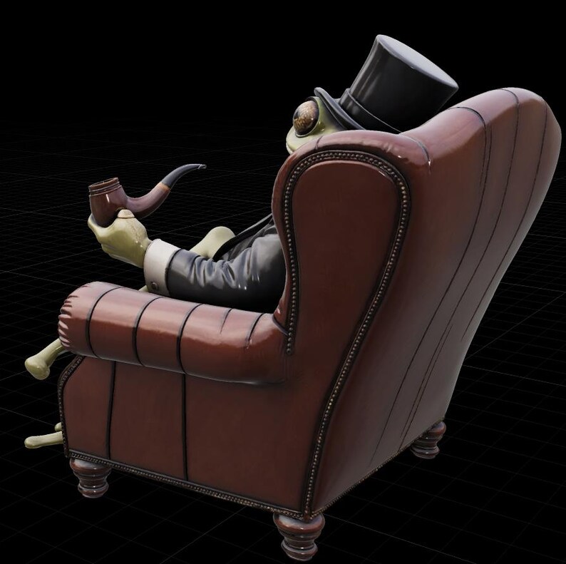 May include: A quirky sculpture of a frog in a black suit and top hat, seated in a brown leather armchair. The frog is holding a pipe, with its legs crossed. The chair has a high back and nailhead trim.