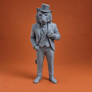 May include: A gray monochromatic figurine of an anthropomorphic lion wearing a formal three-piece suit, a cravat, and a top hat. The lion stands in a relaxed pose with one hand tucked into a trouser pocket and the other resting on the chest.