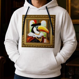Bluza z kapturem z tukanem i oprawionym portretem zwierzęcia