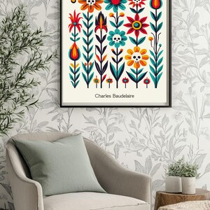 May include: A framed print with a white background and colorful flowers with skulls. The title of the print is "LES FLEURS Du MAL" and the artist is "Charles Baudelaire".