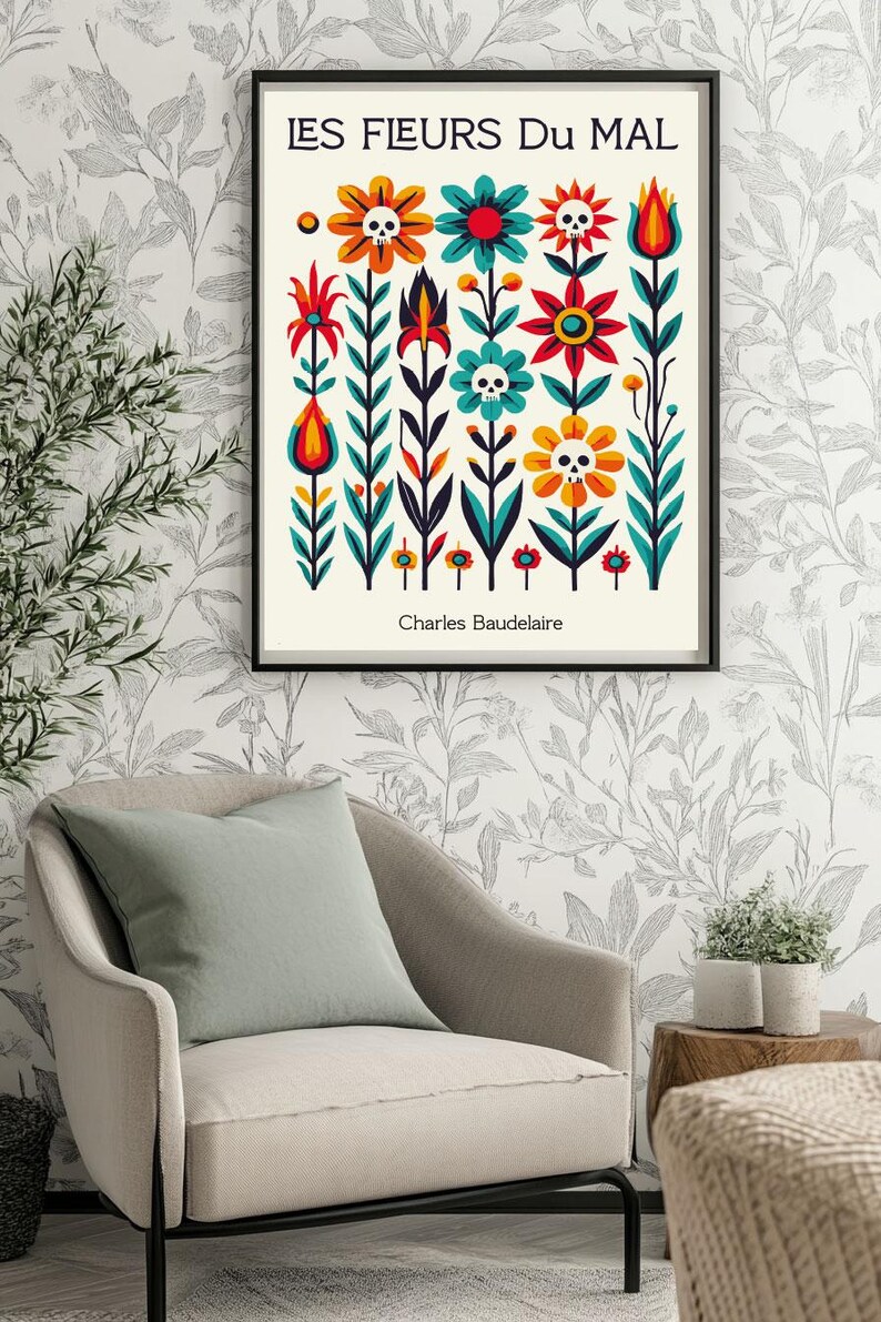 May include: A framed print with a white background and colorful flowers with skulls. The title of the print is "LES FLEURS Du MAL" and the artist is "Charles Baudelaire".