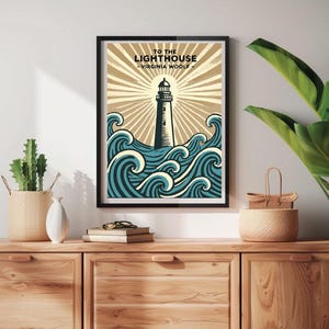 May include: A black framed poster with a vintage illustration of a lighthouse in the ocean. The poster has the text "To the Lighthouse - Virginia Woolf -" at the top.