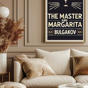 May include: A black and gold poster with a stylised cat face and the text "THE MASTER AND MARGARITA BULGAKOV".