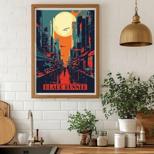 May include: A retro-style poster with a cityscape in shades of blue, orange, and red. The poster features a large, yellow moon and the text "BLADE RUNNER".