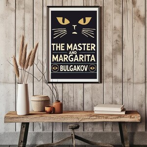 May include: A black and white poster featuring a stylised cat face and the text "THE MASTER AND MARGARITA BULGAKOV" in yellow lettering.