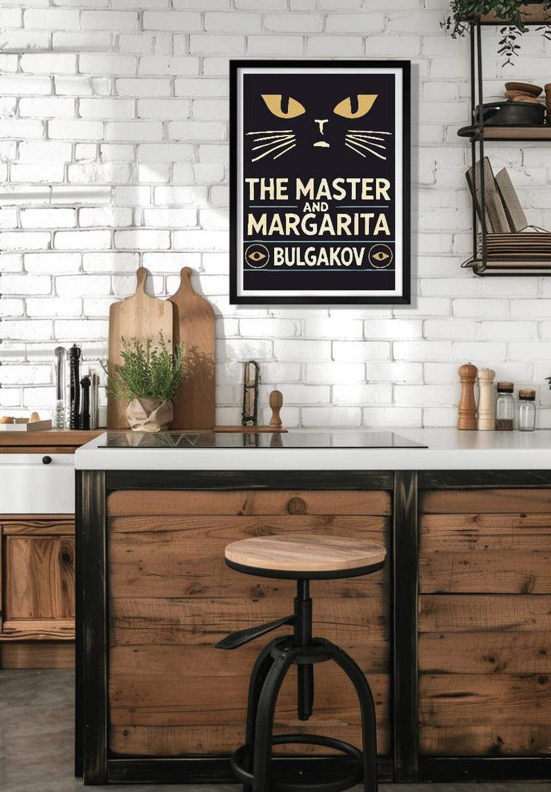 May include: A black and gold framed poster featuring a black cat illustration and the text "THE MASTER AND MARGARITA BULGAKOV" in gold lettering.