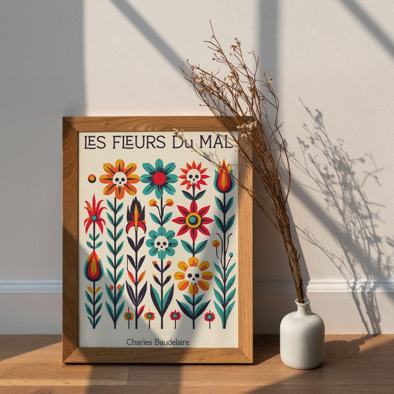 May include: A framed print of a colorful floral design with skulls. The title of the print is "LES FLEURS DU MAL" by Charles Baudelaire.