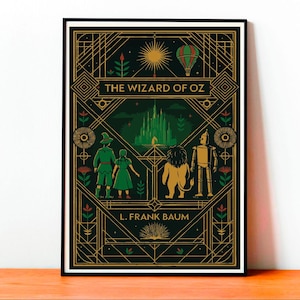Puede incluir: Impresión artística enmarcada que presenta una ilustración estilizada de "El Mago de Oz". La obra de arte muestra personajes como el Espantapájaros, Dorothy, el León y el Hombre de Hojalata, con un fondo verde de la Ciudad Esmeralda. El título y el nombre del autor están en dorado.