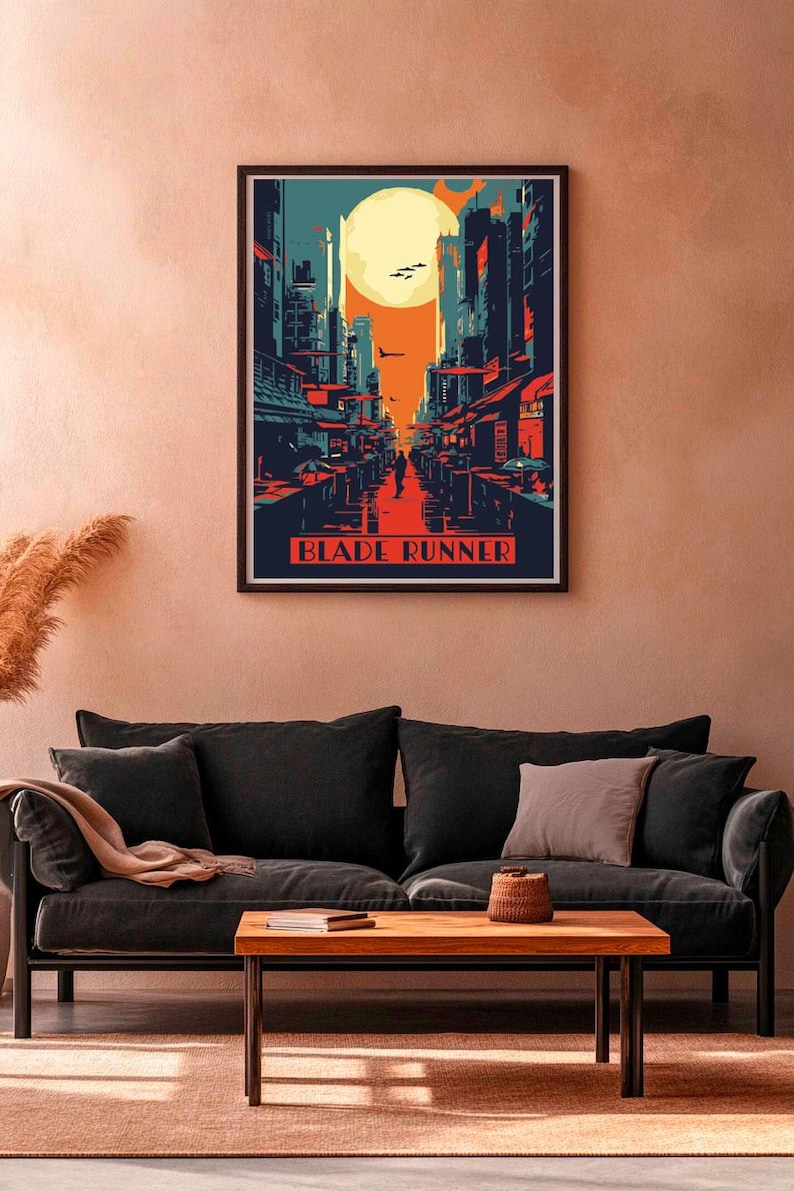 May include: A retro-style poster with a cityscape illustration in shades of blue, red, and orange. The poster features a large, yellow moon and the text "Blade Runner".