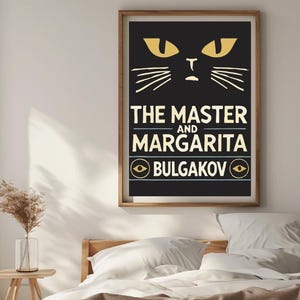 May include: A black and white poster featuring a stylised illustration of a cat's face with yellow eyes. The text "THE MASTER AND MARGARITA BULGAKOV" is printed in yellow on the poster.