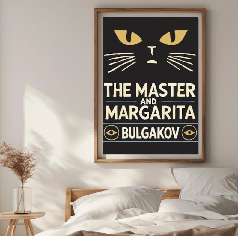 May include: A black and white poster featuring a stylised illustration of a cat's face with yellow eyes. The text "THE MASTER AND MARGARITA BULGAKOV" is printed in yellow on the poster.