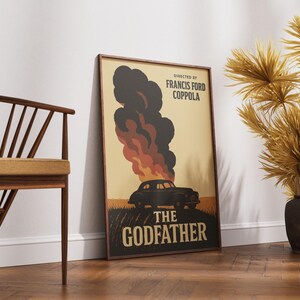 May include: A vintage-style poster for the movie "The Godfather" directed by Francis Ford Coppola. The poster features a black car driving through a field with a large plume of smoke behind it.