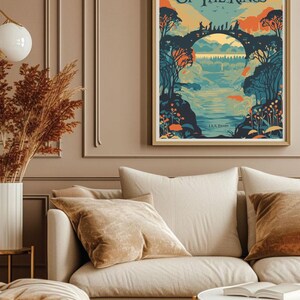 May include: A vintage-style poster with a blue, green, and orange color scheme depicting a scene from "The Lord of the Rings" with the text "The Lord of the Rings" and "J.R.R. Tolkien" printed on the poster.