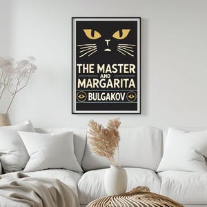 May include: Black and white poster featuring a yellow cat face and the text "THE MASTER AND MARGARITA BULGAKOV"