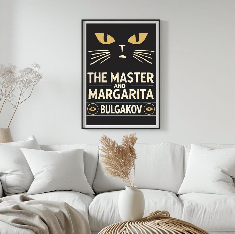 May include: Black and white poster featuring a yellow cat face and the text "THE MASTER AND MARGARITA BULGAKOV"