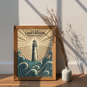 May include: A framed print of a lighthouse with waves crashing around it. The print is titled "To the Lighthouse" by Virginia Woolf.