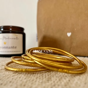 Traditionele boeddhistische armband FIN goud