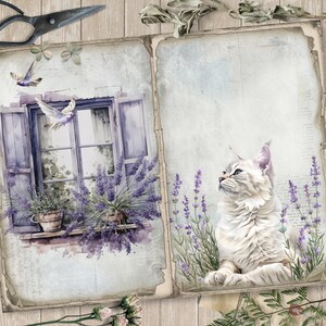 May include: Watercolor illustration of a vintage-style journal spread. One page depicts a window with lavender and doves, the other a white cat in a lavender field. The pages have a distressed, aged look, with a key and scissors nearby.