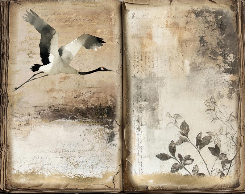 May include: An open book with a watercolor painting of a crane in flight on the left page. The right page has a faded background with a floral design.