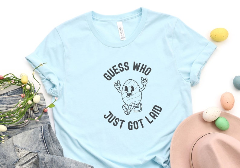 Funny Easter Shirt, Guess Who Just Got Laid, Easter Shirt, Easter Egg Shirt, Easter Bunny T-Shirt, Cute Easter Gift, Easter Shirt For Woman Heather Ice Blue