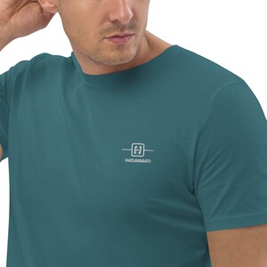 May include: A teal blue t-shirt with a white embroidered logo that says "Hadamard" and a small square with the letter "H" inside.