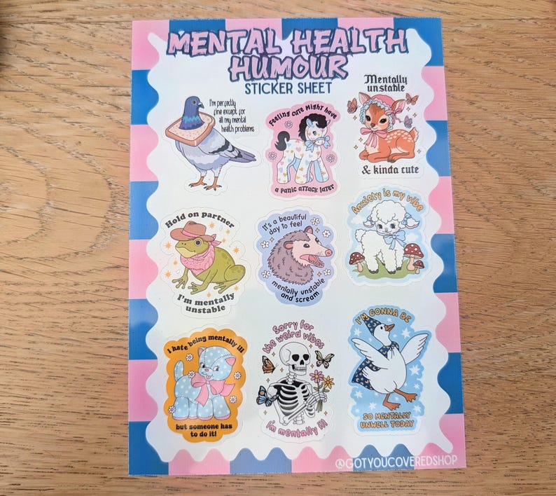 May include: A sticker sheet titled Mental Health Humour featuring nine illustrations including a pigeon with bread, a pony, a fawn, a frog in a hat, an opossum, a lamb, a blue cat, a skeleton, and a goose, all with text captions.