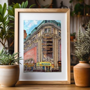 May include: A watercolour painting of a vintage theatre building in New York City. The building has a red brick facade with green trim and a sign that reads "Shubert Theatre".