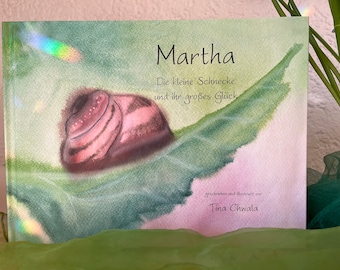 Libro ilustrado "Martha, la pequeña caracola"