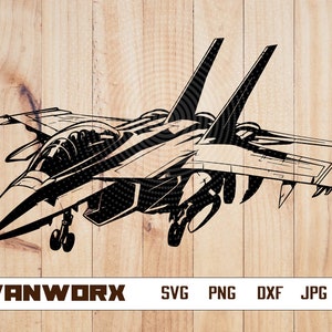 May include: Black and white silhouette of a fighter jet with a detailed design. The jet is facing left and has its wings spread out. The image is set against a wood grain background.