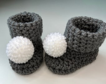 Baby Pom Pom booties. New baby gift. Hand crochet baby gifts.