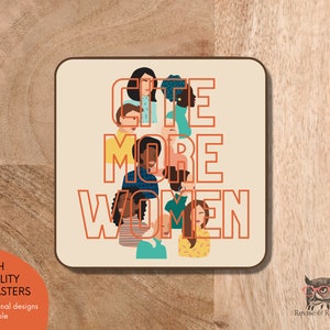 May include: A beige coaster with the text "Cite More Women" in orange. The text is surrounded by illustrations of women of different races and ethnicities.