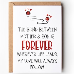 May include: A white greeting card with a brown envelope featuring two red map pins connected by a black line with small red hearts. The text reads: THE BOND BETWEEN MOTHER & SON IS FOREVER. FOREVER. WHEREVER LIFE LEADS, MY LOVE WILL ALWAYS FOLLOW.